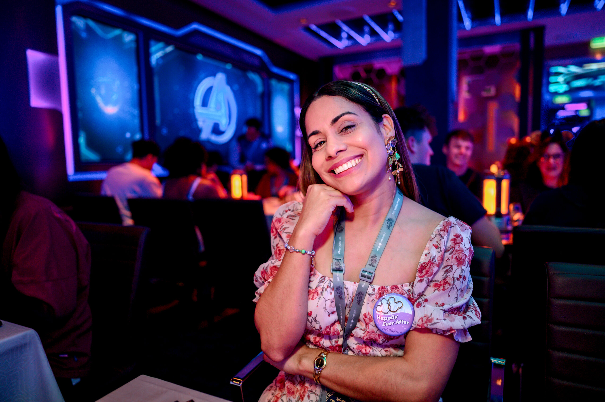 A photo of Idalis, founder of One Magical Travel, at the Marvel restaurant aboard the Disney Treasure.
